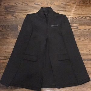 Kiind of cape/jacket